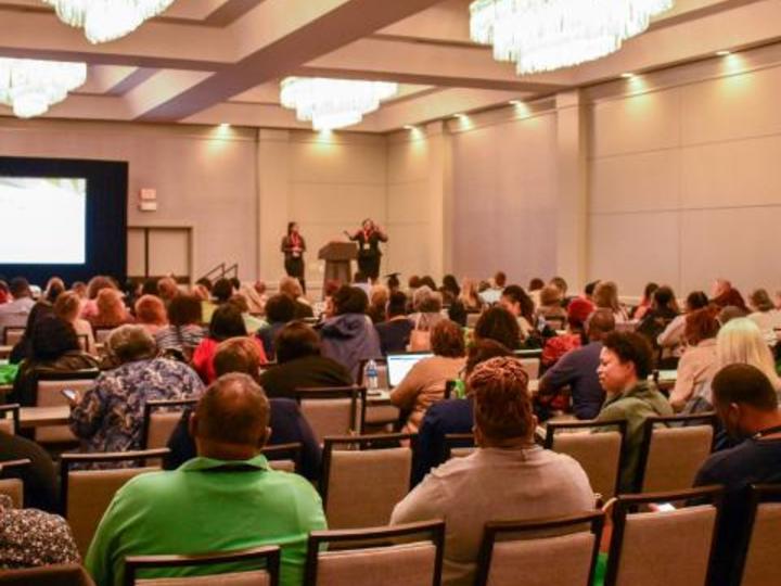 people sitting in a conference