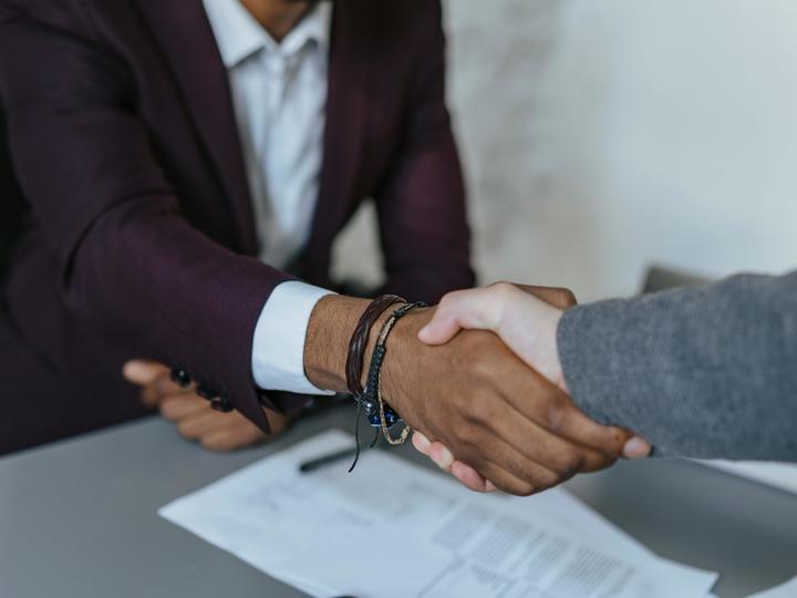 two men shaking hands