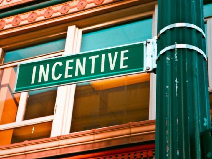 street sign that says "Incentives"