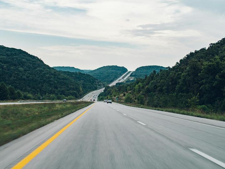 a highway road with trees