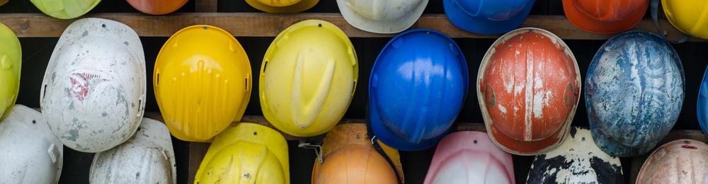 various colors of hardhats