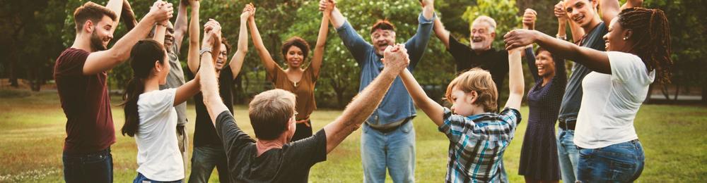 image of various age, and race people holding hands